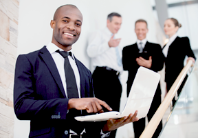 Man Holding a Laptop